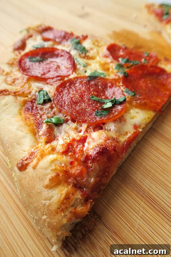 pepperoni thin crust pizza slice