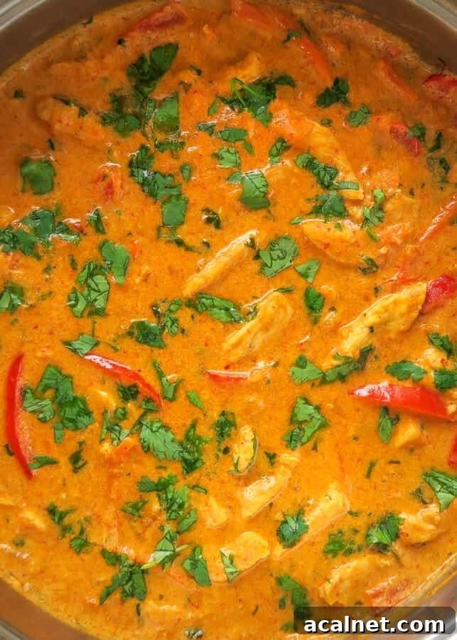 Overhead shot of Thai Red Curry Chicken in a skillet