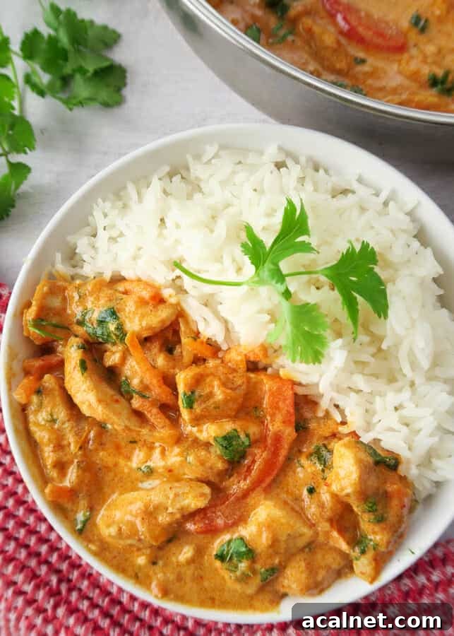 a bowl of rice with Thai Red Curry Chicken