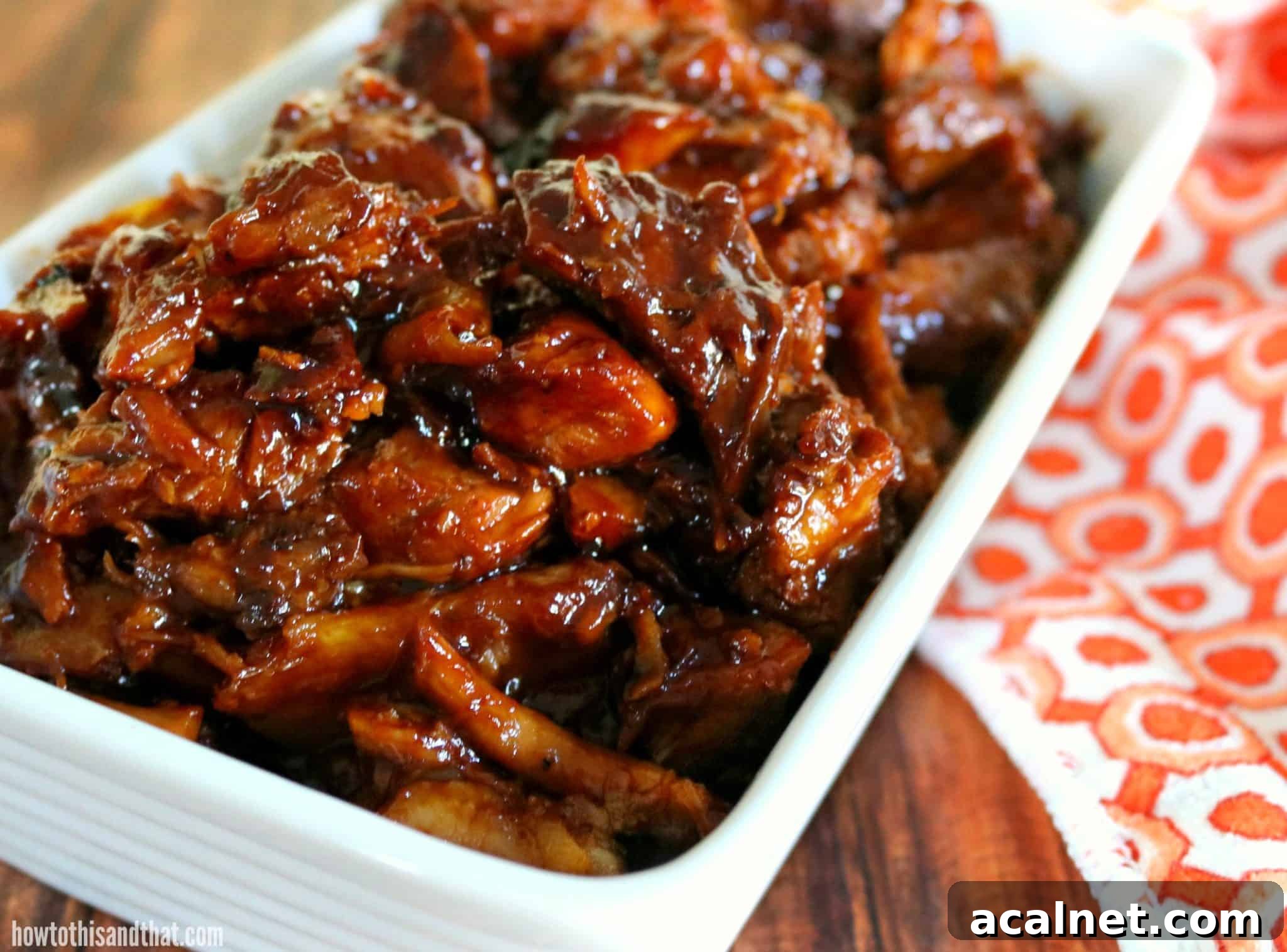 bbq pork pieces in a white dish.