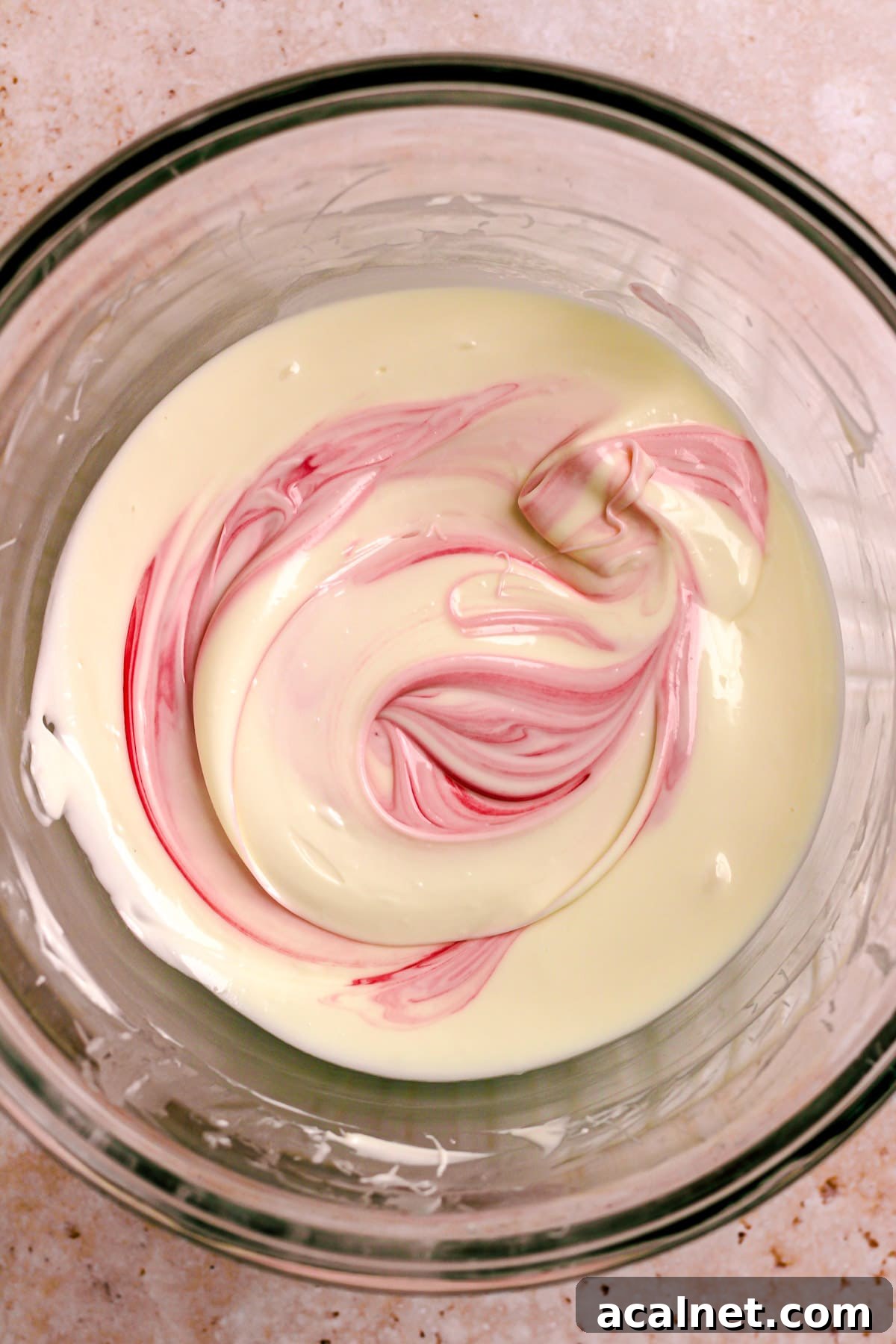 Stirring in red food coloring