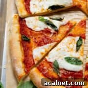 Homemade Greek Yogurt Pizza Dough: Soft, Quick Recipe 15 Homemade margherita pizza made with soft, doughy, and high-protein Greek Yogurt Pizza Dough.