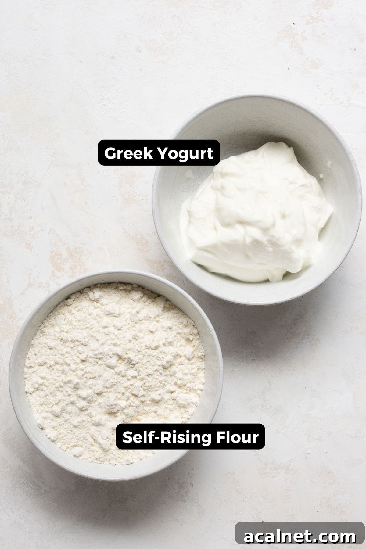 Homemade Greek Yogurt Pizza Dough: Soft, Quick Recipe 3 All ingredients for Greek Yogurt Pizza Dough, including self-rising flour and Greek yogurt.