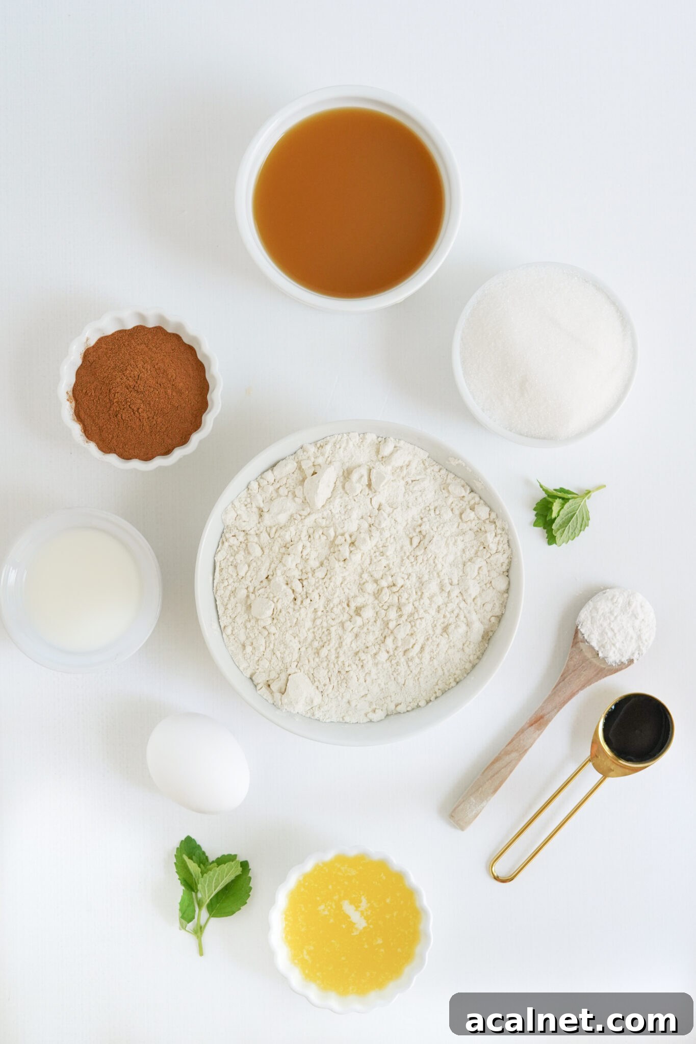 apple cider donut holes ingredients on a white table