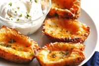 Fully Loaded Crispy Potato Skins with Cheese and Bacon