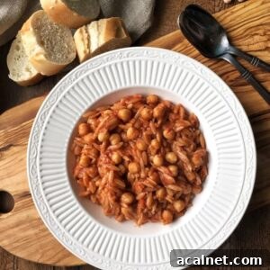 An oven baked vegan version of Greek youvetsi recipe with chickpeas and orzo.