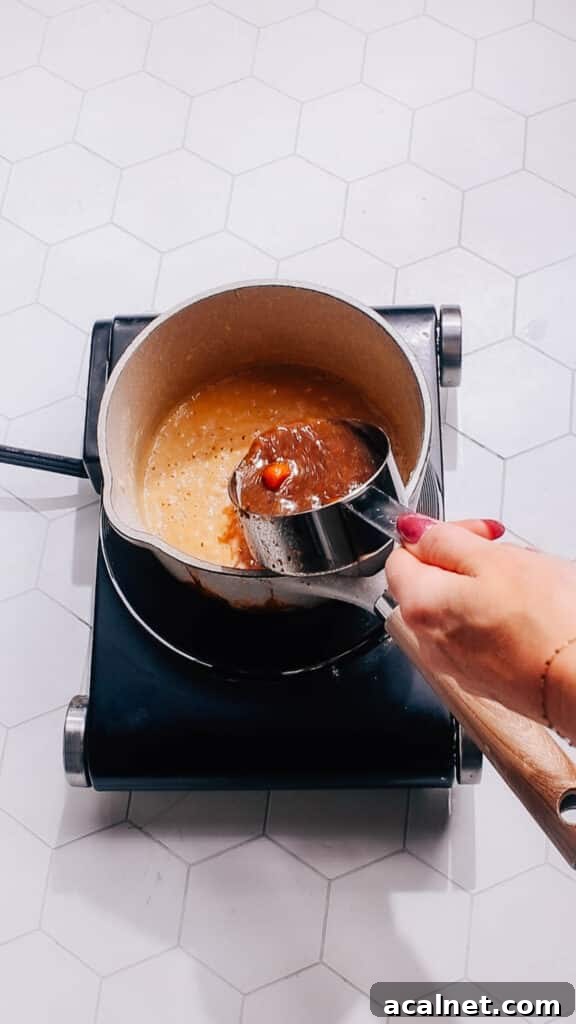 Classic Beef Pot Pie with Flaky Pastry Crust 8 Adding the cooking liquid to make pot pie gravy.