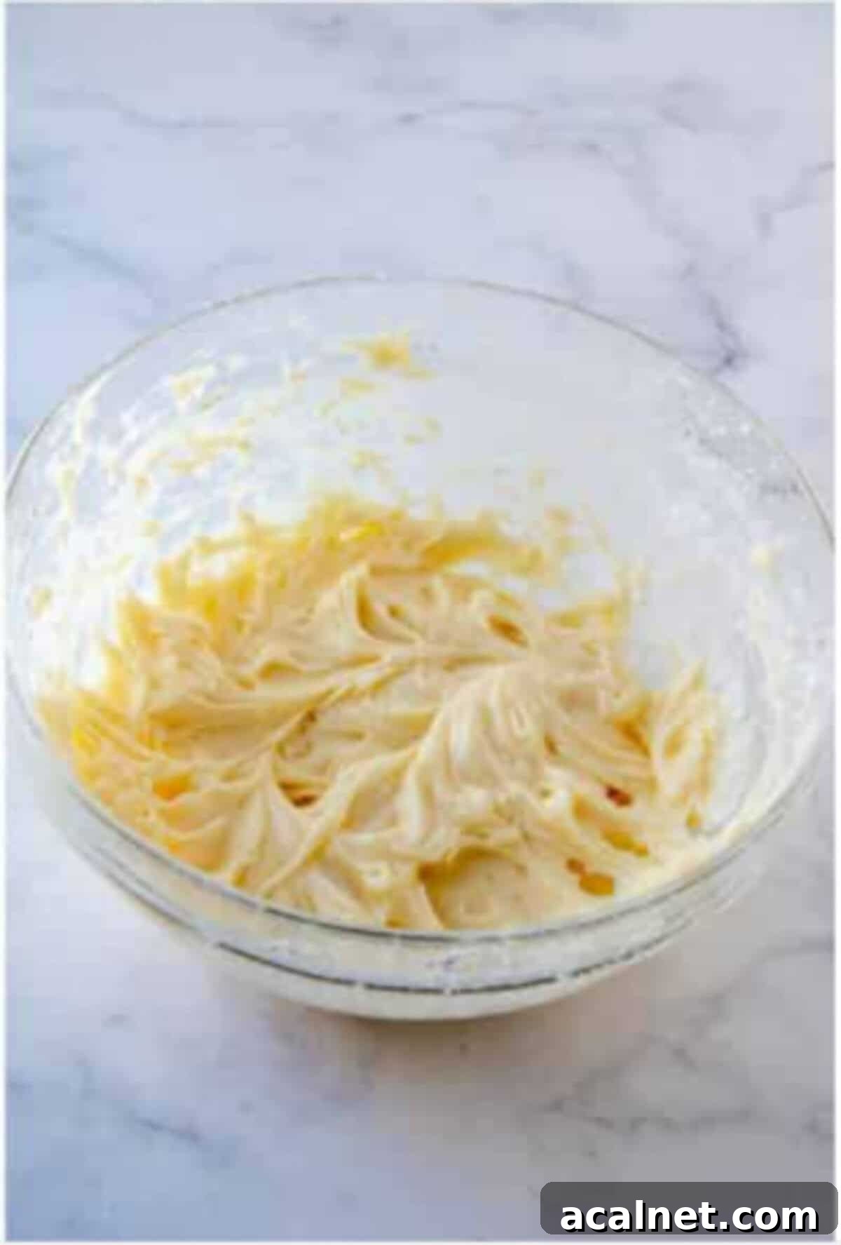 White chocolate and coconut added to the strawberry cheesecake mixture.