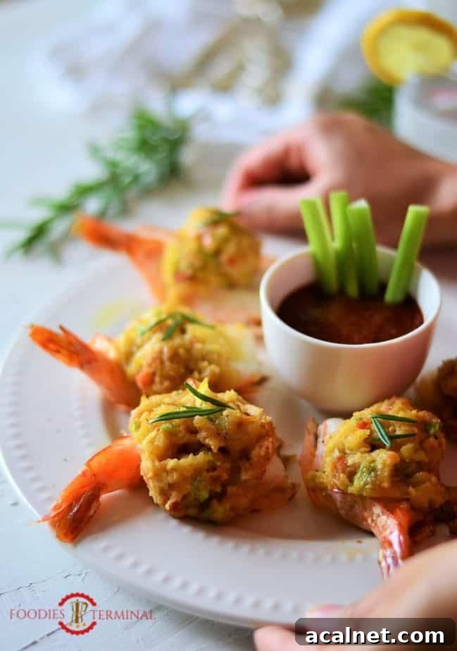 Easy Baked Stuffed Shrimp with Crabmeat & Ritz crackers served on a plate.