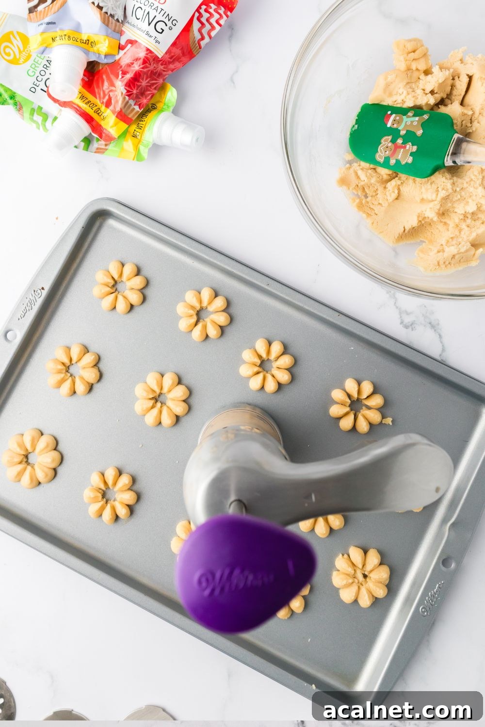 Classic Christmas Spritz Cookie Recipe 11 spritz cookies on baking sheet
