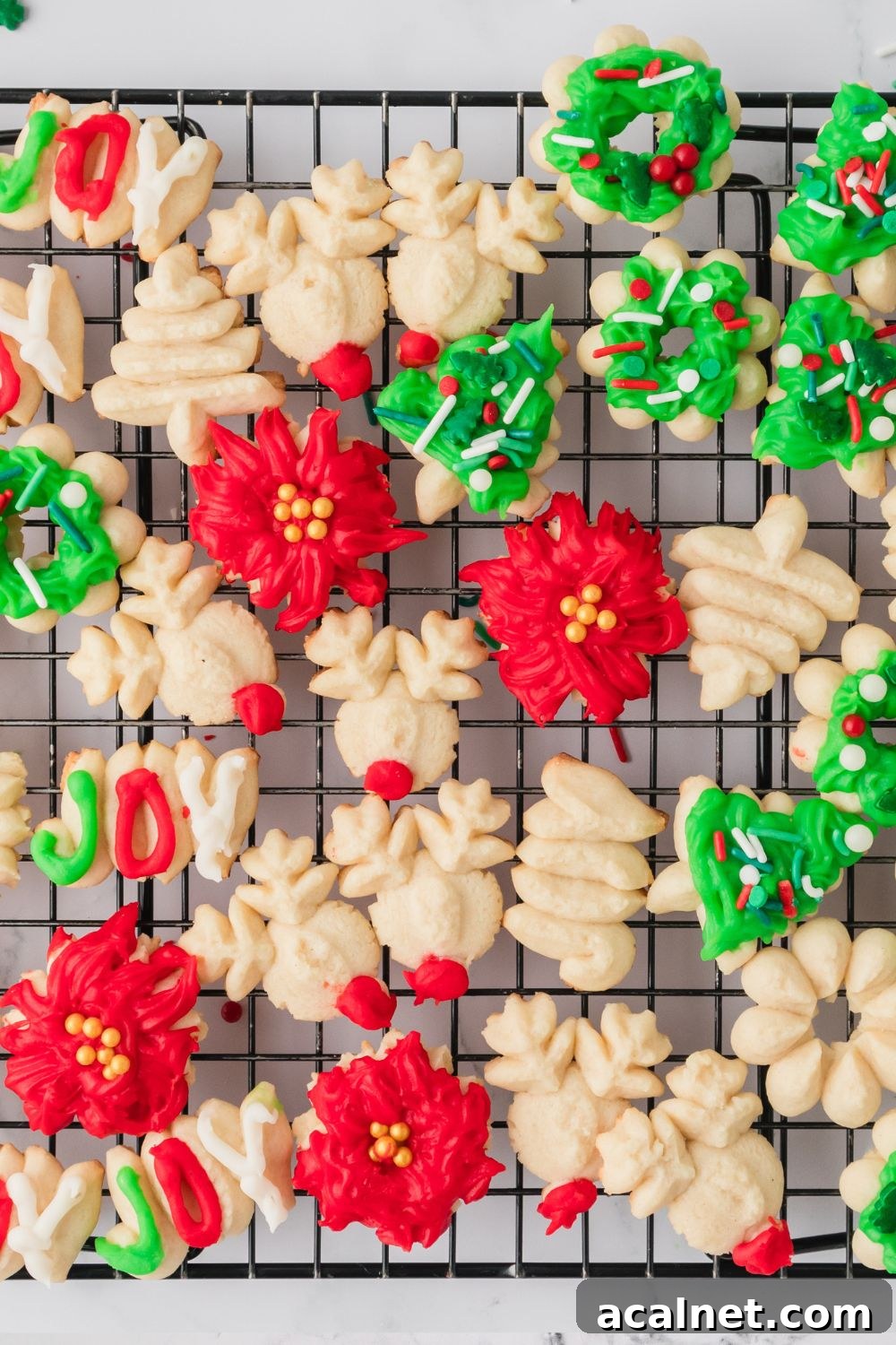 Classic Christmas Spritz Cookie Recipe 18 pressed cookies on plate