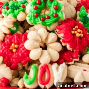 Classic Christmas Spritz Cookie Recipe 24 Christmas Spritz Cookies stacked on platter