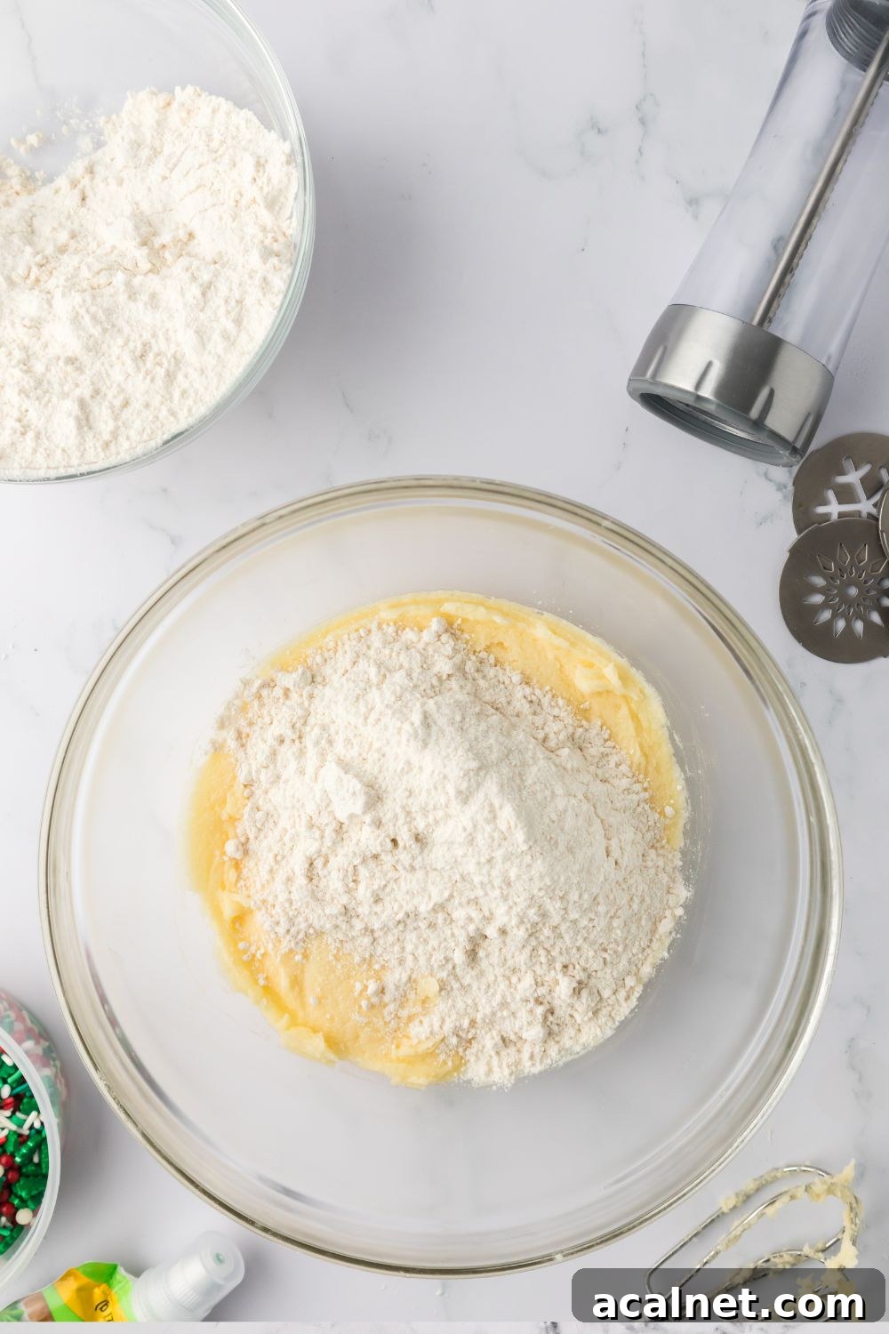 Classic Christmas Spritz Cookie Recipe 7 cookie dough in a glass bowl on table