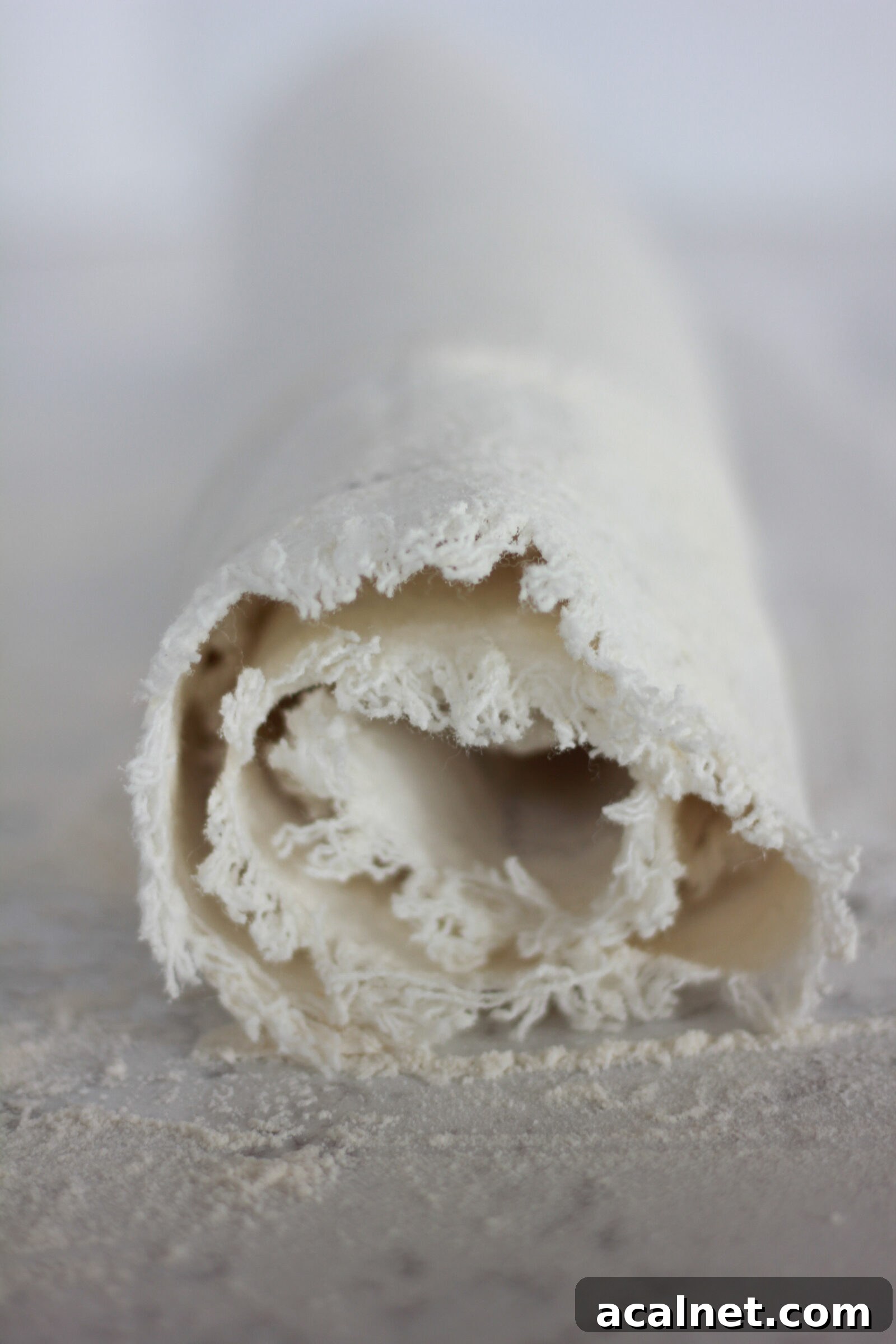 Spreading buttercream on cake