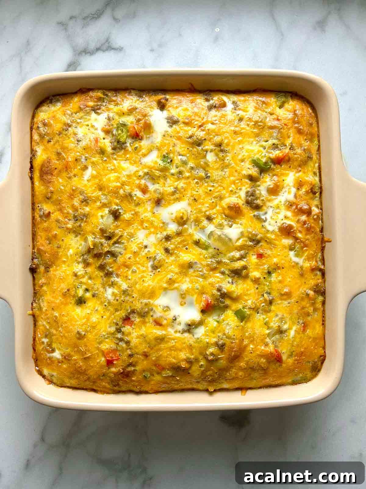 Hearty Breakfast Casserole with Sausage and Cheese 10 overhead shot of breakfast casserole after baking.