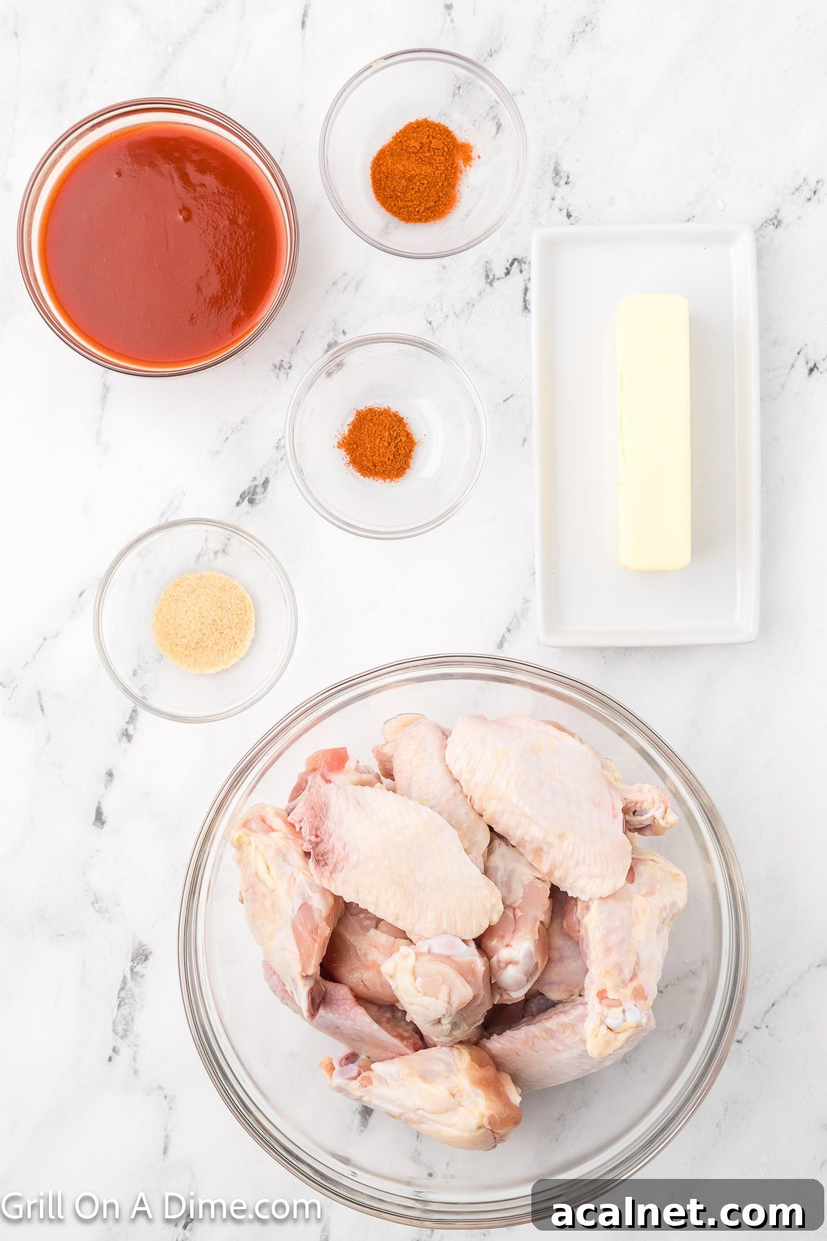Ingredients - Chicken Wings, hot sauce, butter, garlic powder, paprika, cayenne pepper